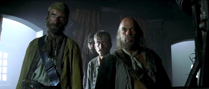 Lee Arenberg, Mackenzie Crook, Treva Etienne, and Michael Berry Jr. in Pirates of the Caribbean: The Curse of the Black Pearl (2003)